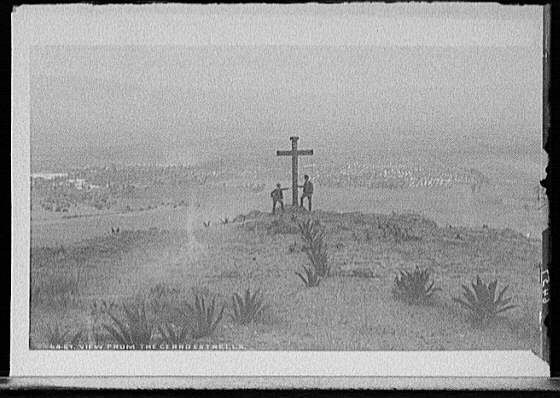 View of a cross above Mexico City circa 1880